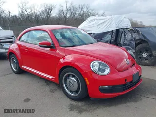 2012 Volkswagen Beetle 2.5L PZEV with VIN 3VWJP7AT4CM608099, listed as a IAAI auction lot 41566505 with 130,189 mi miles. Bid and sale history available at carsss.com. Image 1.