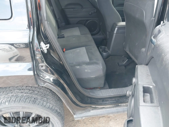 2014 Jeep Patriot Sport with VIN 1C4NJPBB9ED850994, listed as a IAAI auction lot 41888721 with 89,556 mi miles. Bid and sale history available at carsss.com. Image 8.
