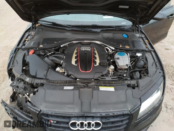 2015 Audi S7 z VIN WAUW2AFC2FN012266, wystawiony jako Copart lot #72085762 z przebiegiem 63 813 mil mil oraz . Historia ofert i sprzedaży dostępna na DreamBid. Obrazek 12.