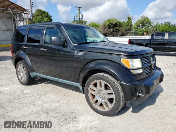 2011 Dodge Nitro Heat with VIN 1D4PT4GKXBW607823, listed as a Copart auction lot 64602325 with 107,666 mi miles and Clean title. Bid and sale history available at DreamBid. Image 4.