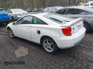 2000 Toyota Celica GTS with VIN JTDDY32T7Y0017943, listed as a IAAI auction lot 41684674 with 176,098 mi miles. Bid and sale history available at carsss.com. Image 3.