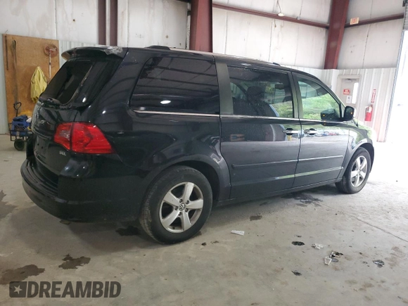 2012 Volkswagen Routan z VIN 2C4RVADG0CR355752, wystawiony jako Copart lot #53687155 z przebiegiem 132 903 mil mil oraz Szkoda całkowita • Salvage title. Historia ofert i sprzedaży dostępna na DreamBid. Obrazek 3.
