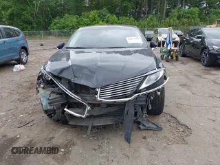2014 Lincoln MKZ z VIN 3LN6L2GK1ER829764, wystawiony jako IAAI lot #42075349 z przebiegiem 229 251 mil mil oraz . Historia ofert i sprzedaży dostępna na DreamBid. Obrazek 6.
