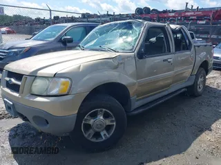 2003 Ford Explorer Sport Trac XLS z VIN 1FMZU77E23UC35868, wystawiony jako IAAI lot #42530211 z przebiegiem 223 483 mil mil oraz . Historia ofert i sprzedaży dostępna na DreamBid. Obrazek 17.