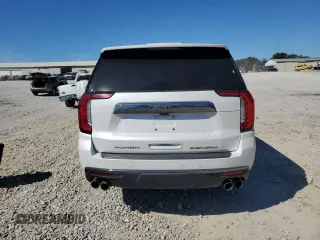 2023 GMC Yukon Denali Ultimate with VIN 1GKS2EKL0PR132029, listed as a Copart auction lot 77234034 with 58,071 mi miles and Salvage Title. Bid and sale history available at carsss.com. Image 6.