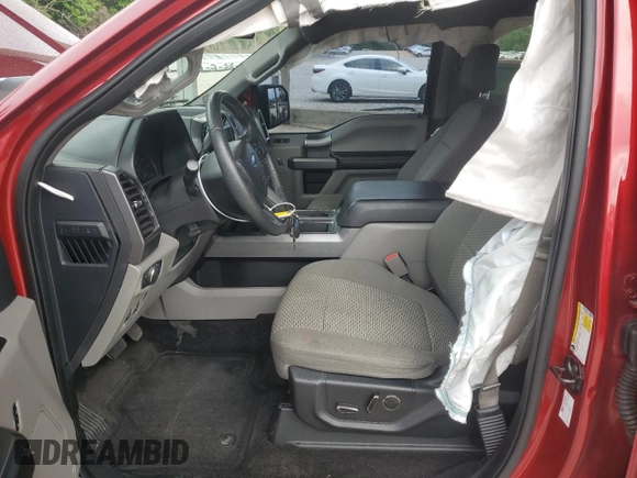2015 Ford F-150 XL with VIN 1FTEW1CP3FFA62176, listed as a Copart auction lot 55364185 with 129,519 mi miles and Salvage title. Bid and sale history available at DreamBid. Image 7.