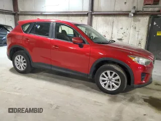 2016 Mazda CX-5 Sport z VIN JM3KE4BY9G0824021, wystawiony jako Copart lot #52392345 z przebiegiem 121 990 mil mil oraz Szkoda całkowita • Salvage title. Historia ofert i sprzedaży dostępna na DreamBid. Obrazek 4.