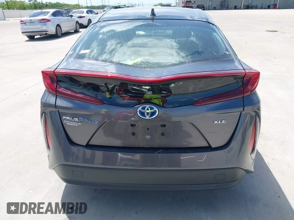 2021 Toyota Prius LE with VIN JTDKAMFP3M3193640, listed as a IAAI auction lot 42023593 with 17,841 mi miles and . Bid and sale history available at DreamBid. Image 17.