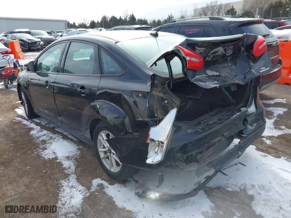 2016 Ford Focus SE with VIN 1FADP3F21GL235559, listed as a IAAI auction lot 41624268 with 136,330 mi miles. Bid and sale history available at carsss.com. Image 3.
