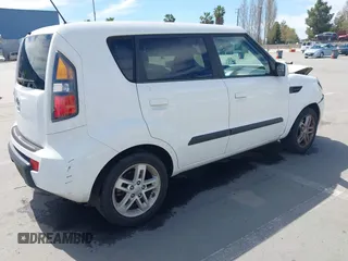 2010 Kia Soul + with VIN KNDJT2A21A7128666, listed as a IAAI auction lot 42019160 with 113,198 mi miles. Bid and sale history available at carsss.com. Image 4.