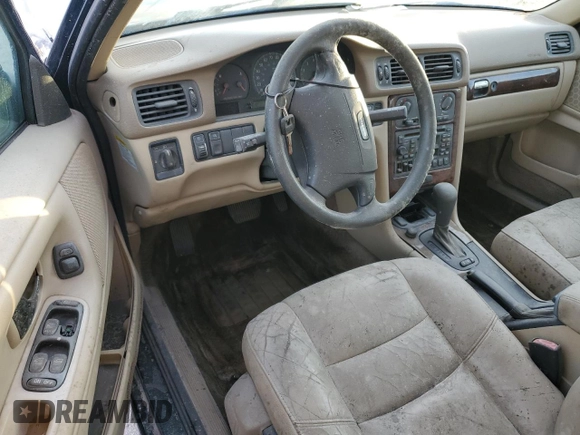 1998 Volvo S70 z VIN YV1LS5675W3511553, wystawiony jako Copart lot #75102454 z przebiegiem Nie podano mil oraz Szkody całkowita. Historia ofert i sprzedaży dostępna na DreamBid. Obrazek 8.