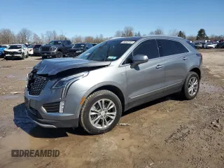 2022 Cadillac XT5 AWD Premium Luxury with VIN 1GYKNDR44NZ138564, listed as a Copart auction lot 49443165 with 51,828 mi miles and Salvage title. Bid and sale history available at DreamBid. Image 1.
