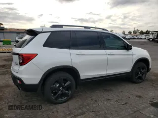 2021 Honda Passport Elite with VIN 5FNYF8H02MB039538, listed as a Copart auction lot 50265265 with 16,737 mi miles and Salvage Title. Bid and sale history available at carsss.com. Image 3.
