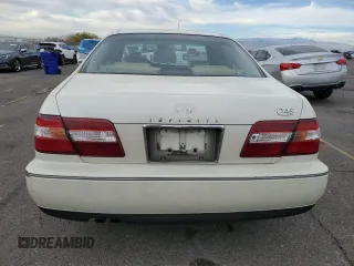 1998 Infiniti Q45 z VIN JNKBY31A8WM403038, wystawiony jako Copart lot #86904484 z przebiegiem 136 142 mil mil oraz Szkoda całkowita • Salvage title. Historia ofert i sprzedaży dostępna na DreamBid. Obrazek 6.