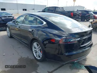 2014 Tesla Model S 60 с VIN 5YJSA1H17EFP41957, выставлен на аукционе IAAI как лот 42448795 с пробегом 103 990 миль миль и . История ставок и продаж доступна на DreamBid. Изображение 3.