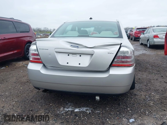 2008 Ford Taurus SEL with VIN 1FAHP24W68G122802, listed as a IAAI auction lot 42020217 with 168,265 mi miles. Bid and sale history available at carsss.com. Image 16.