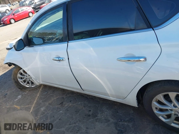 2019 Nissan Sentra S z VIN 3N1AB7AP4KY265082, wystawiony jako IAAI lot #41642989 z przebiegiem 75 937 mil mil oraz . Historia ofert i sprzedaży dostępna na DreamBid. Obrazek 14.