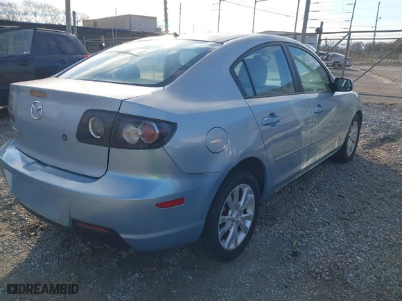 2007 Mazda Mazda3 i Sport with VIN JM1BK12F171667108, listed as a IAAI auction lot 41604559 with 228,509 mi miles. Bid and sale history available at carsss.com. Image 4.