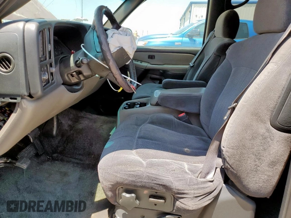 2002 Chevrolet Tahoe LS with VIN 1GNEC13Z82R287588, listed as a Copart auction lot 59098765 with 289,133 mi miles and Salvage title. Bid and sale history available at DreamBid. Image 7.