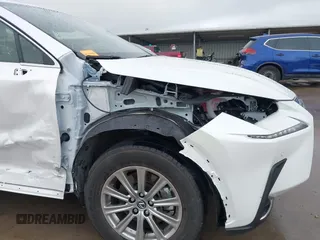 2021 Lexus NX 300 z VIN JTJDARBZ6M2200029, wystawiony jako IAAI lot #42465329 z przebiegiem 20 441 mil mil oraz . Historia ofert i sprzedaży dostępna na DreamBid. Obrazek 21.