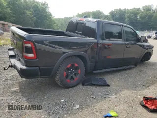 2019 Ram 1500 Rebel with VIN 1C6SRFLT6KN722481, listed as a Copart auction lot 60653285 with 79,447 mi miles and Salvage title. Bid and sale history available at DreamBid. Image 3.