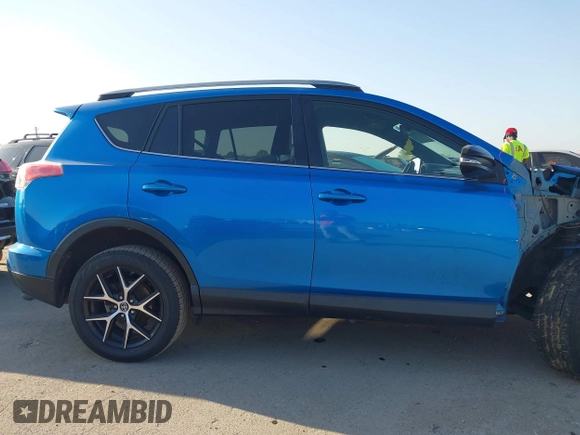 2018 Toyota RAV4 SE with VIN JTMNFREV3JJ156865, listed as a IAAI auction lot 41986697 with 124,979 mi miles and . Bid and sale history available at DreamBid. Image 14.