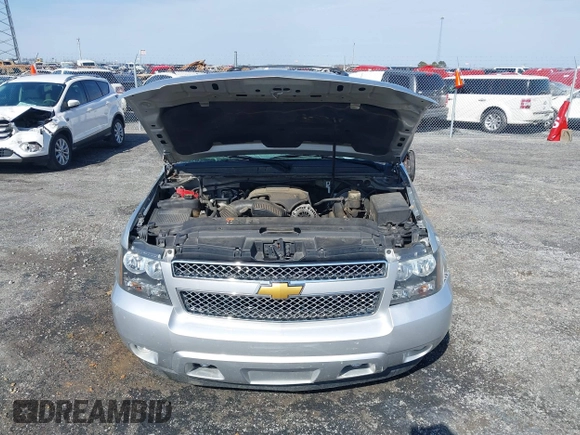2013 Chevrolet Tahoe LT z VIN 1GNSCBE06DR106384, wystawiony jako IAAI lot #41574274 z przebiegiem 168 655 mil mil oraz . Historia ofert i sprzedaży dostępna na DreamBid. Obrazek 10.