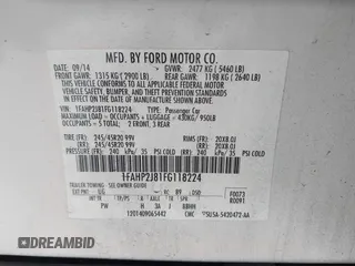 2015 Ford Taurus Limited with VIN 1FAHP2J81FG118224, listed as a IAAI auction lot 42402947 with 142,885 mi miles and . Bid and sale history available at DreamBid. Image 9.