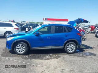 2013 Mazda CX-5 Touring with VIN JM3KE2CE4D0121155, listed as a IAAI auction lot 41983002 with 146,367 mi miles. Bid and sale history available at carsss.com. Image 14.