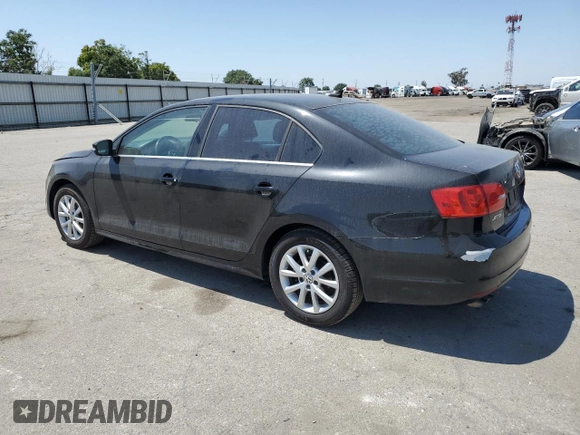 2014 Volkswagen Jetta SE with VIN 3VWD17AJ0EM268515, listed as a Copart auction lot 59977225 with 163,365 mi miles and Salvage title. Bid and sale history available at DreamBid. Image 2.