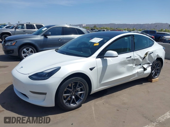 2021 Tesla Model 3 Long Range z VIN 5YJ3E1EB9MF006966, wystawiony jako IAAI lot #41976745 z przebiegiem 37 651 mil mil oraz . Historia ofert i sprzedaży dostępna na DreamBid. Obrazek 2.