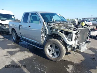 2014 Ram 1500 Express with VIN 1C6RR7FT7ES206698, listed as a IAAI auction lot 42464806 with 265,365 mi miles and . Bid and sale history available at DreamBid. Image 1.