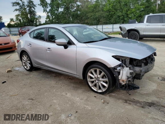 2017 Mazda 3 Touring with VIN 3MZBN1V77HM120387, listed as a Copart auction lot 61496775 with 95,432 mi miles and Salvage title. Bid and sale history available at DreamBid. Image 4.