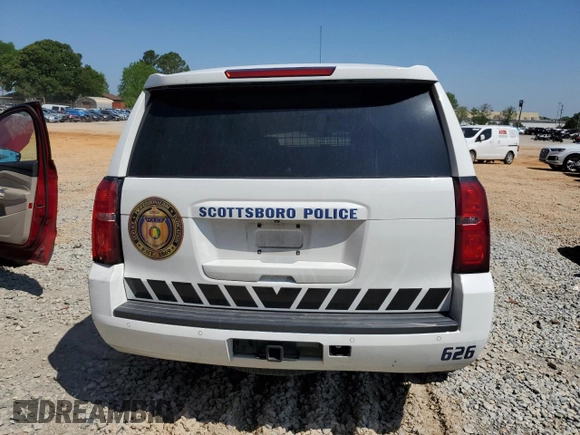 2018 Chevrolet Tahoe Commercial with VIN 1GNLCDEC1JR244940, listed as a Copart auction lot 54713275 with 99,661 mi miles and Salvage title. Bid and sale history available at DreamBid. Image 6.
