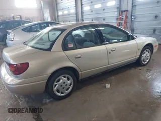 2002 Saturn SL with VIN 1G8ZK52792Z143191, listed as a IAAI auction lot 41831087 with 85,301 mi miles and . Bid and sale history available at DreamBid. Image 4.