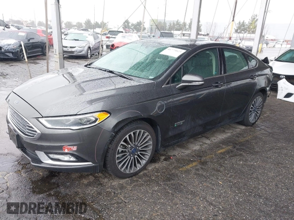 2017 Ford Fusion Titanium with VIN 3FA6P0SU8HR329570, listed as a IAAI auction lot 41773023 with 112,022 mi miles and . Bid and sale history available at DreamBid. Image 2.