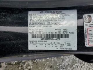 2007 Mercury Milan with VIN 3MEHM07Z07R665050, listed as a Copart auction lot 71824814 with 112,677 mi miles and Salvage Title. Bid and sale history available at carsss.com. Image 14.