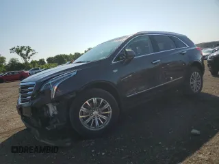 2019 Cadillac XT5 Luxury FWD with VIN 1GYKNCRS1KZ108927, listed as a Copart auction lot 61185875 with 67,618 mi miles and Salvage title. Bid and sale history available at DreamBid. Image 1.