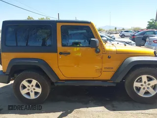 2014 Jeep Wrangler Sport with VIN 1C4AJWAG5EL223883, listed as a IAAI auction lot 42002814 with 134,361 mi miles and . Bid and sale history available at carsss.com. Image 13.