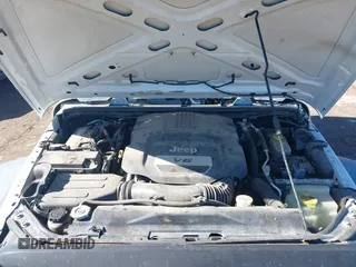 2017 Jeep Wrangler Unlimited Sport with VIN 1C4BJWDG4HL502861, listed as a IAAI auction lot 40895010 with 62,970 mi miles. Bid and sale history available at carsss.com. Image 10.