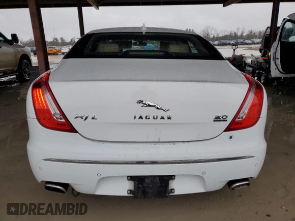 2013 Jaguar XJ Portfolio с VIN SAJWJ2GD4D8V47695, выставлен на аукционе Copart как лот 44997315 с пробегом 195 810 миль миль и Списание • Salvage title. История ставок и продаж доступна на DreamBid. Изображение 6.