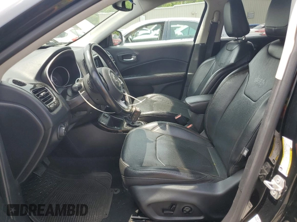 2020 Jeep Compass Limited with VIN 3C4NJCCB1LT231188, listed as a Copart auction lot 57659365 with 77,929 mi miles and Salvage title. Bid and sale history available at DreamBid. Image 7.