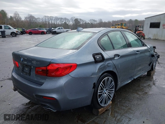 2018 BMW 5 Series 540i xDrive with VIN WBAJE7C52JWC57407, listed as a IAAI auction lot 41805890 with 112,151 mi miles and . Bid and sale history available at DreamBid. Image 4.