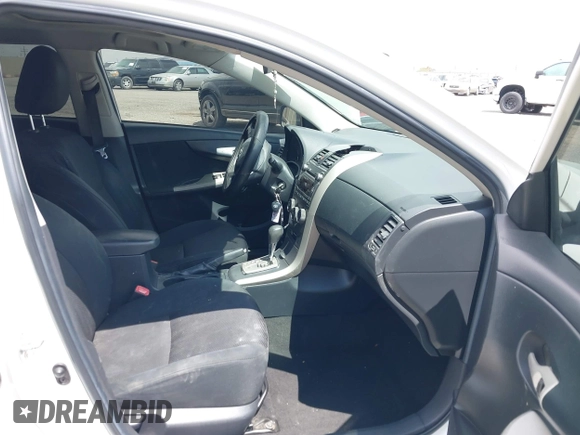 2011 Toyota Corolla L with VIN 2T1BU4EE8BC714122, listed as a IAAI auction lot 42073121 with 221,176 mi miles. Bid and sale history available at carsss.com. Image 5.