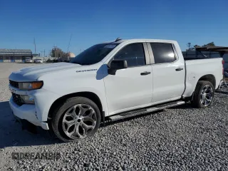 2020 Chevrolet Silverado 1500 Custom with VIN 1GCPWBEH1LZ179009, listed as a Copart auction lot 46751705 with 77,057 mi miles and Salvage Title. Bid and sale history available at carsss.com. Image 1.