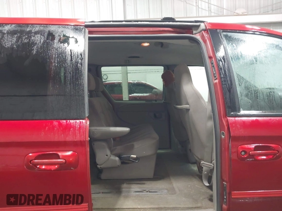 2002 Dodge Grand Caravan with VIN 2B4GT44L42R567657, listed as a IAAI auction lot 41109666 with 178,301 mi miles and . Bid and sale history available at DreamBid. Image 8.