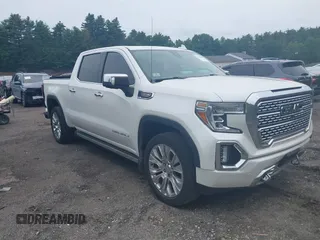 2020 GMC Sierra 1500 Denali with VIN 1GTU9FEL3LZ138662, listed as a IAAI auction lot 42415053 with 77,897 mi miles and . Bid and sale history available at DreamBid. Image 1.
