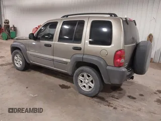 2003 Jeep Liberty Sport with VIN 1J4GL48K83W652993, listed as a IAAI auction lot 41086140 with 115,177 mi miles and . Bid and sale history available at DreamBid. Image 3.