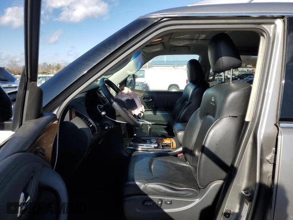 2012 Infiniti QX56 7-passenger with VIN JN8AZ2NE4C9020833, listed as a Copart auction lot 80353974 with 201,872 mi miles and Salvage Title. Bid and sale history available at carsss.com. Image 7.