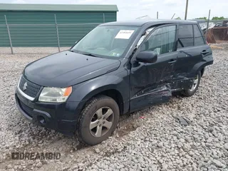 2012 Suzuki Grand Vitara Premium z VIN JS3TD0D6XC4100539, wystawiony jako IAAI lot #42384659 z przebiegiem 143 711 mil mil oraz . Historia ofert i sprzedaży dostępna na DreamBid. Obrazek 17.